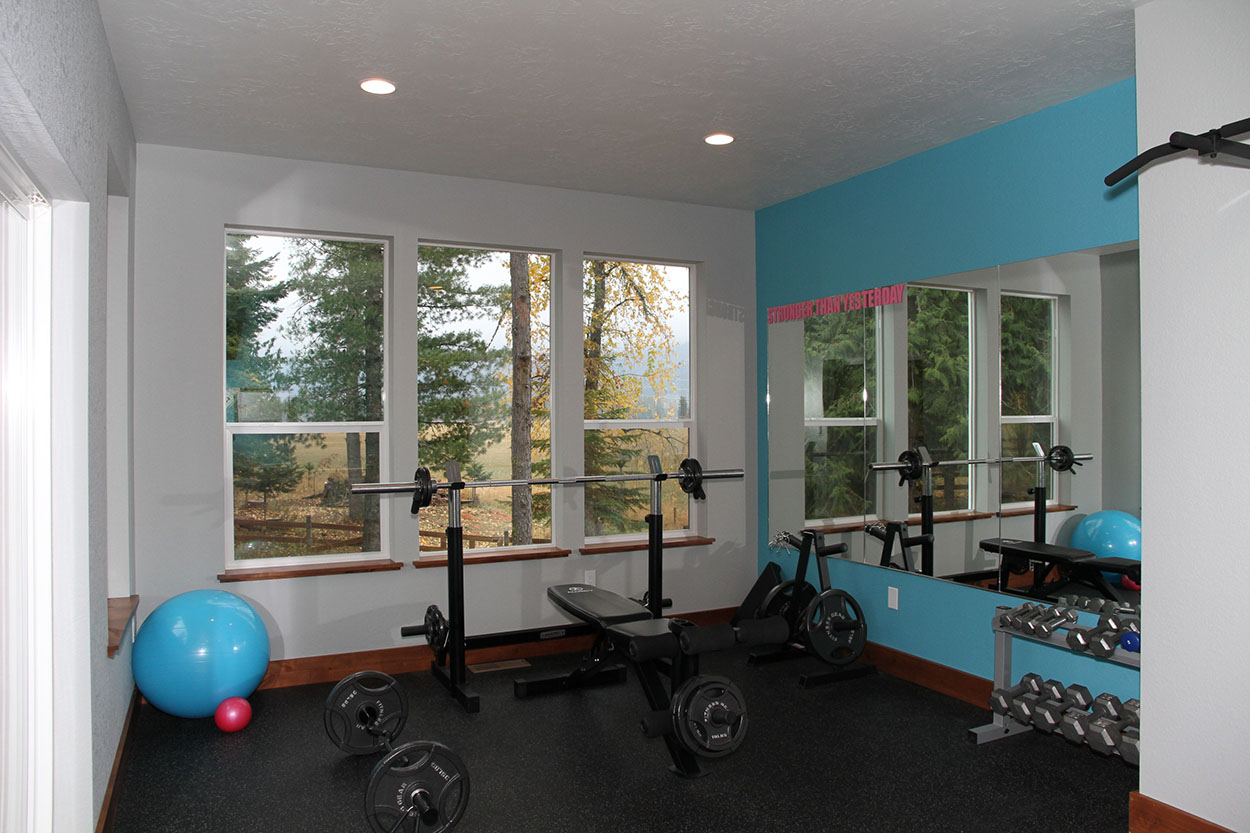 Custom home by Sandpoint Builders in North Idaho, interior gym