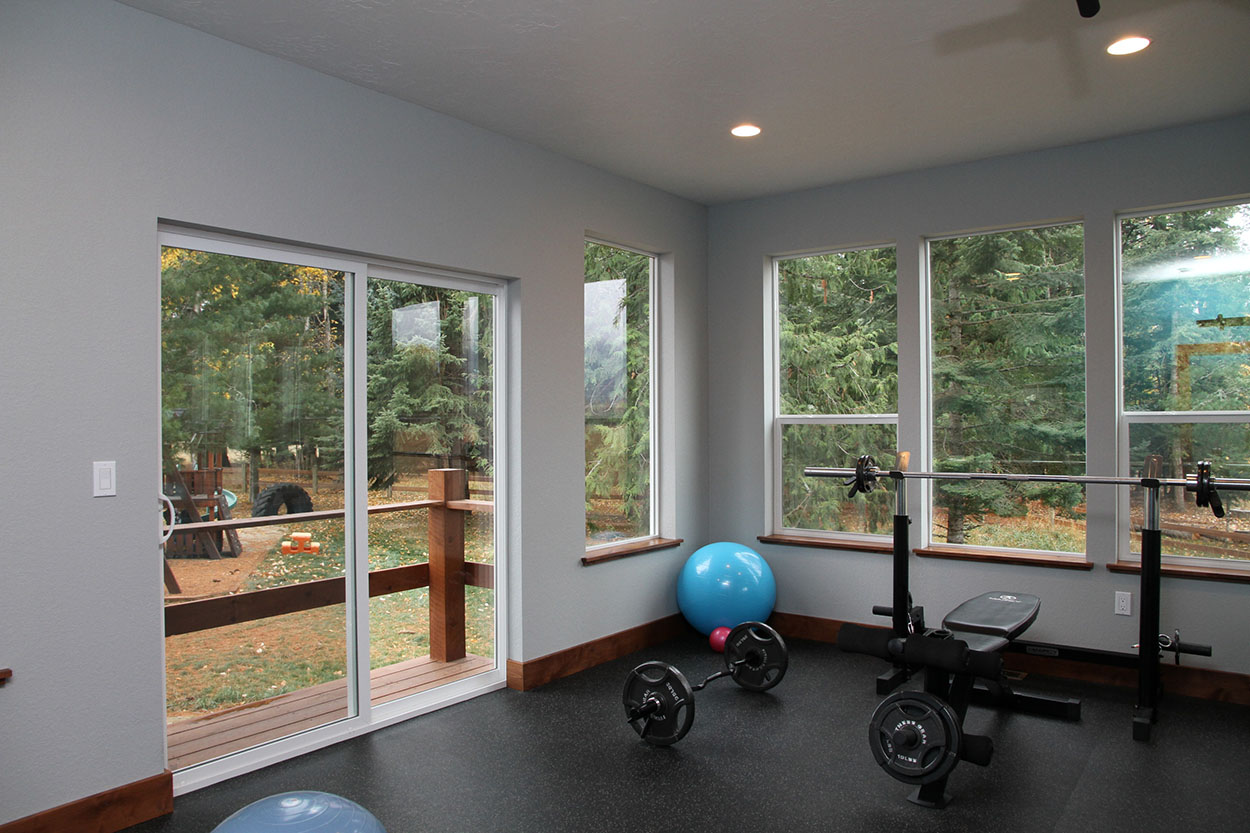 Custom home by Sandpoint Builders in North Idaho, gym