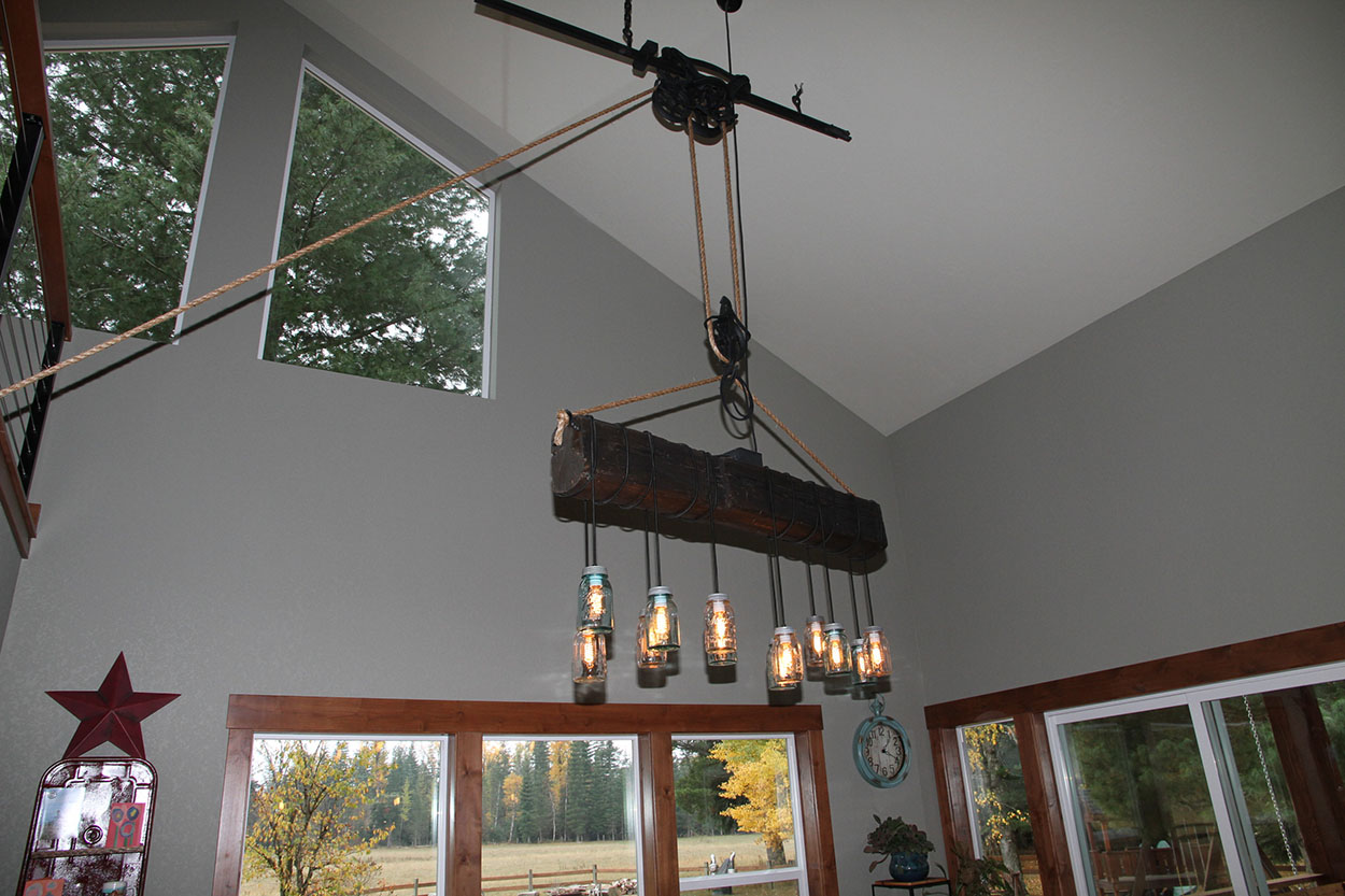 Custom home by Sandpoint Builders in North Idaho, dining room light fixture